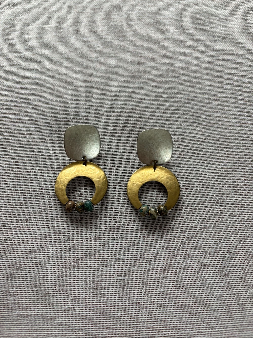 Vintage Marjorie Baer stamped mixed metal and bead artisan earrings.